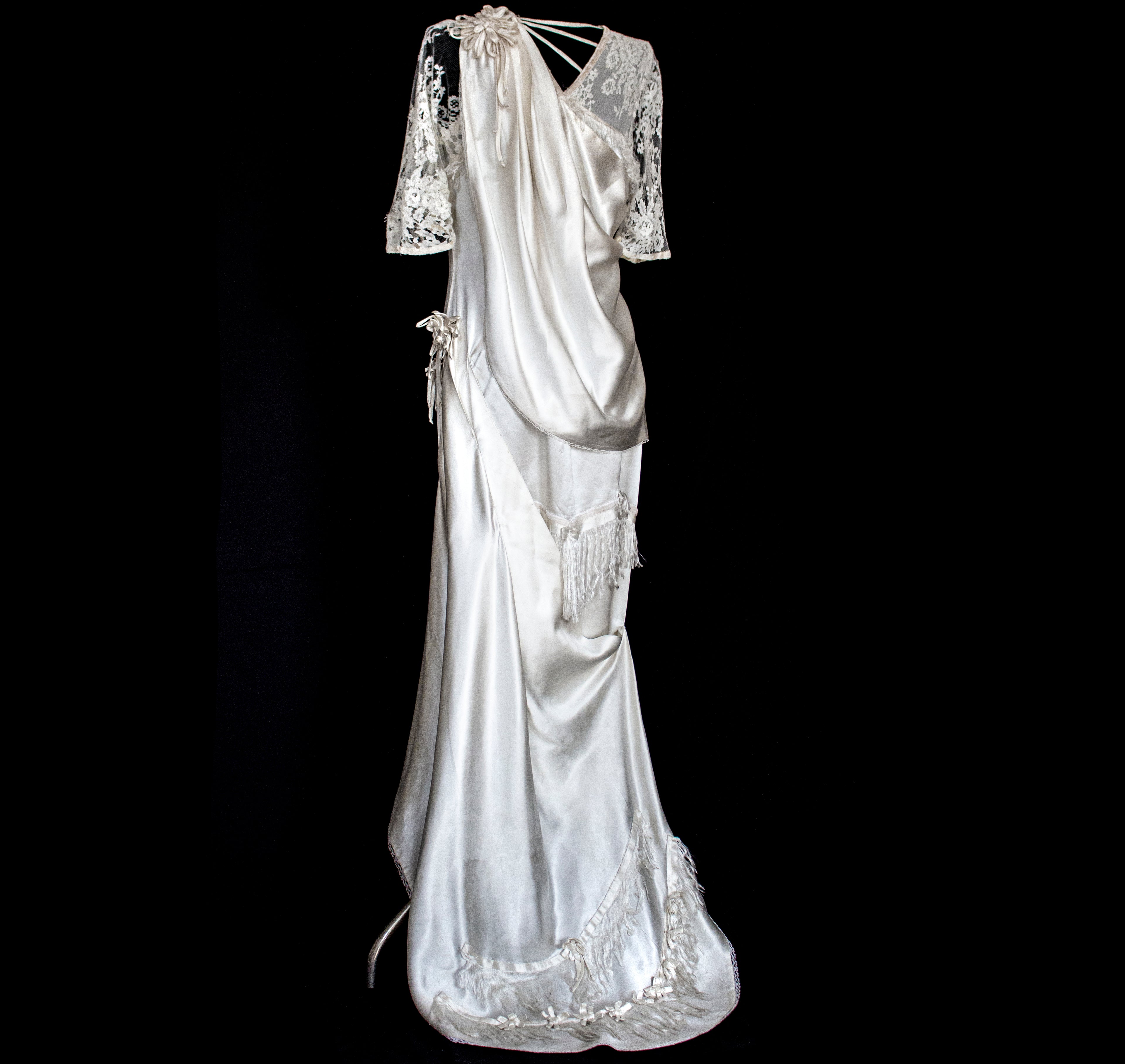 263 - MUSEUM QUALITY 1920S ANTIQUE BRIDAL GOWN: RESTORED ART DECO SILK SATIN & LACE DRESS WITH FRINGES