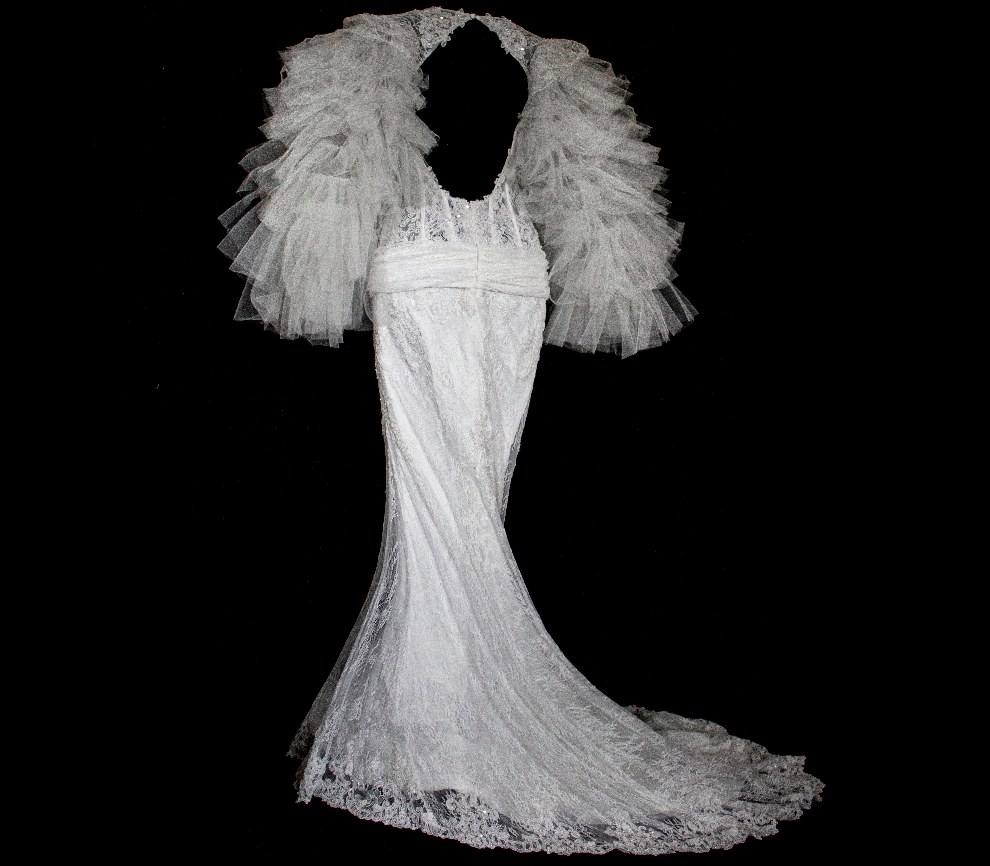 281 - SENSUAL BACKLESS BRIDAL GOWN: NUDE EFFECT EMBROIDERY & VAPOROUS TULLE RUFFLE SLEEVES